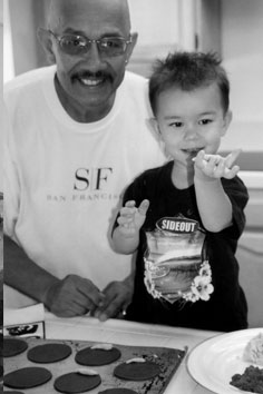 Austin watering his plant