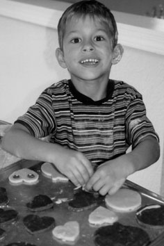 Austi watering his plant