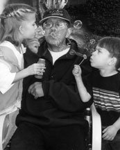 Papa blowing bubbles